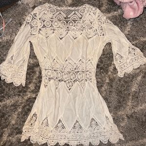 white bathing suit cover up
